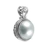 Handmade sterling silver round pendant with Mabe Pearl, artisan crafted in Bali